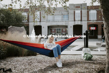 Sarah Maher, a freshman from Cary, Illinois, studies outside the Nebraska Union in her personal hamm