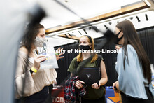 Kate Madsen, a junior in business administration, talks with recruiters at Tuesday’s Career Fair. 