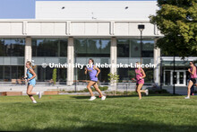 The Delta Gamma team races past the Dinsdale Commons Learning Center en route to solving their next 