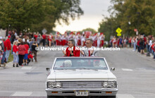 Grand Marshalls Chancellor Ronnie Green and Husker Jane Green chant “Go Big Red” as the parade w