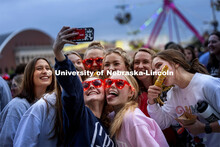 Hailey Olberding, left, and Kellie Kaufman take a selfie with their friends. Homecoming Parade and C