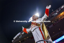 Drum major directing the Cornhusker Marching Band. Nebraska vs Northwestern University homecoming ga