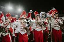 Drum major directing the Cornhusker Marching Band. Nebraska vs Northwestern University homecoming ga