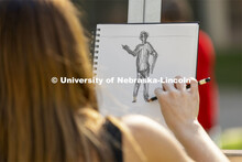 Ella Bartlett works on her drawing. On a great fall day outside Architecture Hall, Chip Stanley’s 