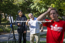 Chip Stanley works with Adham Westbrook on perspective and height during a class assignment. On a gr