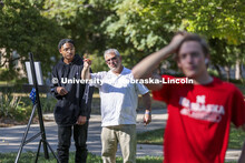 Chip Stanley works with Adham Westbrook on perspective and height during a class assignment. On a gr