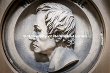 A relief portrait of Wilhelm Sheele, the 18th century chemist who discovered oxygen, adorns a wall o