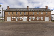 Front of the U.S. Indian School (Genoa Indian School). Students from UNITE tour the Genoa Indian Sch