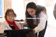 UNITE tour students look through computer records of former students at the Genoa Indian School. Stu