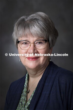 Studio portrait of Leslie Reed, Public Affairs Director, Office of University Communication. October