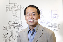 Lisong Xu, professor in the School of Computing with Hamid Bagheri, assistant professor in the Schoo