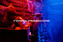 Titus Andronicus, played by Dylanie Eleutice, grinds up his victim, Dane DeTar. Dress rehearsal for 