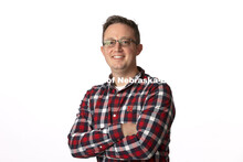 Studio portrait of Jason Stamm, Assistant Professor, College of Journalism and Mass Communications. 
