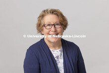 Studio portrait of Jan Deaton, Band Office Associate, Glenn Korff School of Music, Hixson-Lied Colle