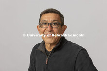 Studio portrait of Eddie Dominguez, Professor, School of Art, Art History and Design, Hixson-Lied Co
