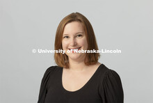 Studio portrait of Leslie Harms, Assistant to the Director, Glenn Korff School of Music, Hixson-Lied