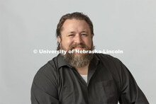 Studio portrait of JD Madsen, Associate Professor, Johnny Carson School of Theatre and Film, Hixson-