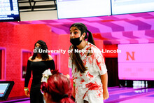Students at Nightmare at East Campus. Students enjoy a fun-tastic night of indoor Halloween-themed a