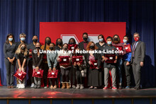 Omaha North NCPA senior cohort. Chancellor Ronnie Green gives admission certificates to Nebraska Col
