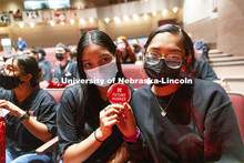 Omaha South seniors Marian Rodriguez and Lizbeth Valente Alday hold up a future Husker sticker from 