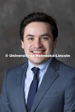 Studio portrait of Edgar Reynaga, Nebraska University Foundation Assistant Director of Marketing and