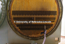 Hundreds of tubes used to exchange heat in a chiller await cleaning. City Campus utility plant. Nove