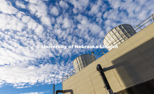 Cooling towers at the city campus power plant under a blue sky. City Campus utility plant. November 