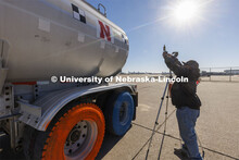 Dave Charrion checks a camera alignment used for a speed check before the tanker was driven back to 