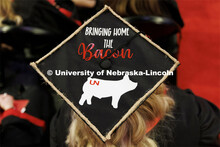 Decorated mortarboards at the Undergraduate Commencement at Pinnacle Bank Arena. December 18, 2021. 