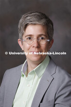 Studio portrait of Scout Calvert, Associate Professor for University Libraries. January 5, 2022. 