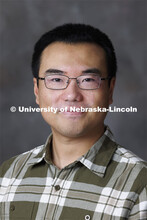 Studio portrait of Qinnan Yang, Post-Doc Research Associate, Nebraska Food for Health Center, in Foo
