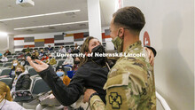 Spc. Allen Castaneda surprises his sister, Priscila, at the end of her criminal justice class. Casta