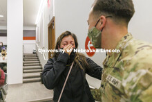Spc. Allen Castaneda surprises his sister, Priscila, at the end of her criminal justice class. Casta