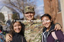 Spc. Allen Castaneda with his sisters, Priscila, left, and Leslie at the end of her criminal justice