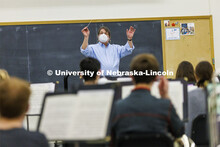 The Symphonic Band class conducted by Tony Falcone rehearses Monday afternoon in a Kimball Recital H