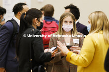 Olivia Bonta listens to opportunities at the UNL Spring Career Fair in the Nebraska Union. February 