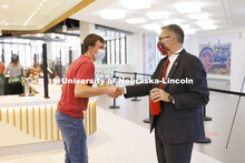Chancellor Ronnie Green talks with Benjamin Janssen, a junior from Marquette, Nebraska, at the Nebra