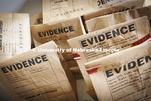 Evidence bags are collected and labeled by students. Students do crime scene investigation in the mu