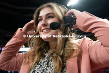 Hailey Ryerson puts on her headphones before the Huskers’ Women’s Basketball match against Minne