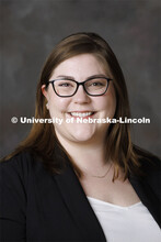 Studio portrait of Maggie Miller, Assistant Director of Recruitment and Retention for the College of