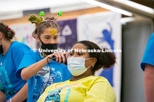 Students shave their hair to raise money. University of Nebraska–Lincoln students exceeded their g