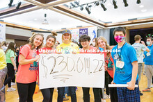 Students reveal the total raised during the 2022 HuskerThon. University of Nebraska–Lincoln studen