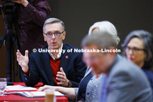 Chancellor Ronnie Green talks with the group as Executive Vice Chancellor Katherine Ankerson listens