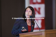 Shelley Zaborowski, Executive Director of Nebraska Alumni Association, talks with the group. Chancel