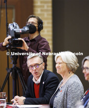 Chancellor Ronnie Green talks with the group as Executive Vice Chancellor Katherine Ankerson listens