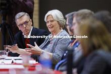 Executive Vice Chancellor Katherine Ankerson talks with the group as Chancellor Ronnie Green listens