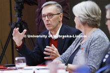 Chancellor Ronnie Green talks with the group as Executive Vice Chancellor Katherine Ankerson listens