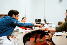 Students taste sausages with varying levels of salt to learn how salt affects taste. UNL Meat Scienc