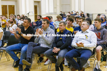 Lukasz Niparko, a graduate student in political science, talks with the audience. Stand With Ukraine