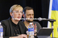 Courtney Hillebrecht, Director of Human Rights and Humanitarian Affairs, talks with the audience. In